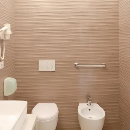Rocca - Rooms&spa Couette-café